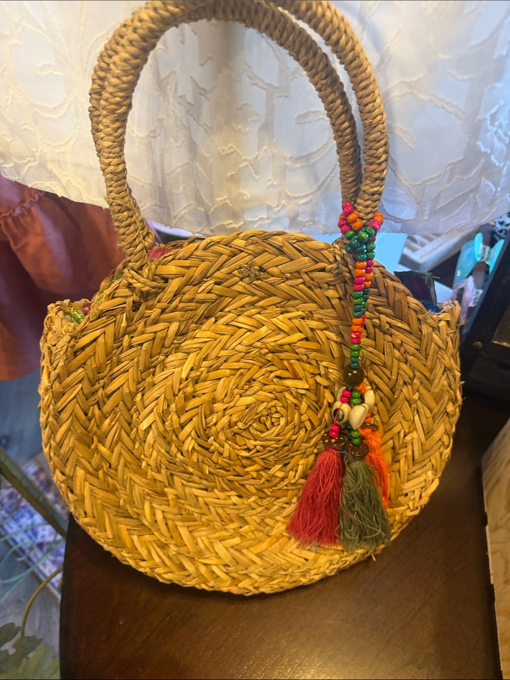 Capelli of New York Tan Straw Round Tote with Multicolor Beaded Tassels